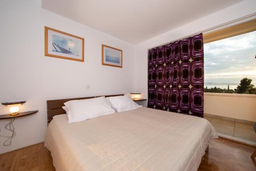 Posteľ alebo postele v izbe v ubytovaní lux apartment