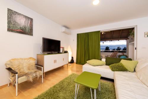 Μια τηλεόραση ή/και κέντρο ψυχαγωγίας στο lux apartment