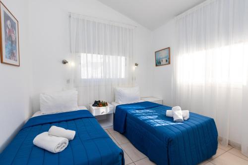 Postel nebo postele na pokoji v ubytování Fig Tree Z Holiday Resort