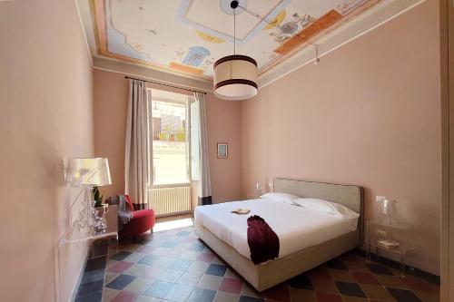 Un pat sau paturi într-o cameră la Monti Apartments - My Extra Home