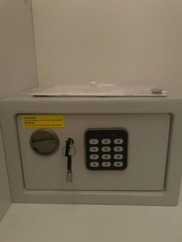 a machine with a remote control and a key at Sweet dreams at the seaside in Skála Foúrkas