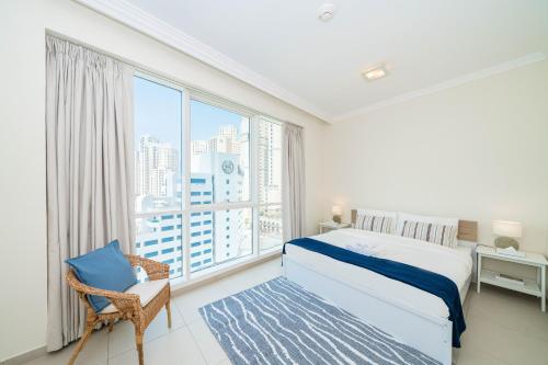 Postel nebo postele na pokoji v ubytování ALH Vacay - Amazing 2 BR in Jumeirah Beach Residences