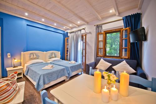 Postel nebo postele na pokoji v ubytování Flamingo Hotel Pelion - Seaside Superior Studios & Suites