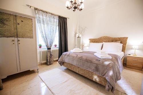 A bed or beds in a room at Stefania's Home