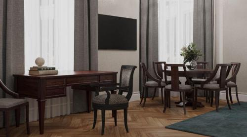 Télévision ou salle de divertissement dans l'établissement Hotel Victoria