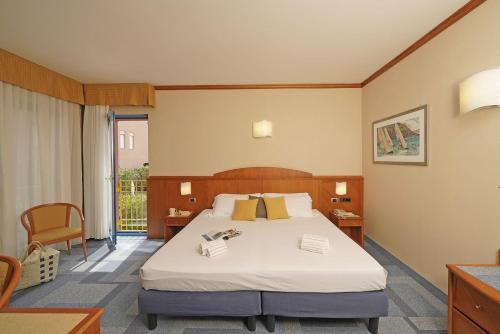 Postel nebo postele na pokoji v ubytování Hotel Sportsman