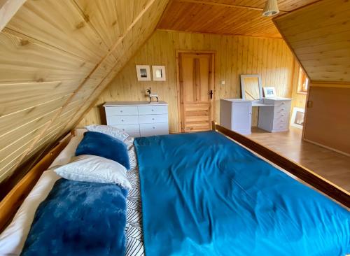 מיטה או מיטות בחדר ב-Amalka Wita