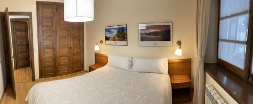 Łóżko lub łóżka w pokoju w obiekcie Precioso y acogedor cerca de pistas by Renttarter
