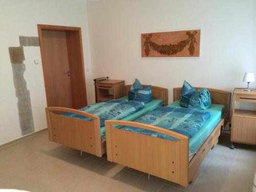 Cama o camas de una habitación en Heiterer Blick am Malerweg Pirna