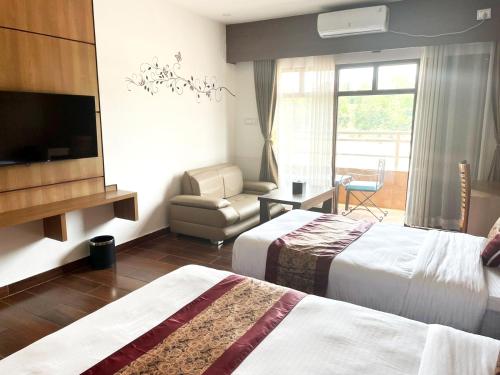 Кровать или кровати в номере Ashoka Resort Pvt. Ltd