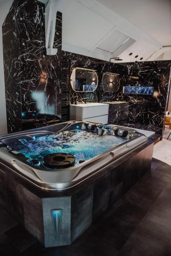 Φωτογραφία από το άλμπουμ του Quinze suites et wellness de luxe σε Ciney