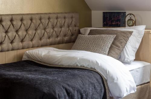 Letto o letti in una camera di Talaria Resort&SPA
