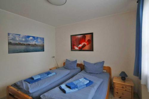Postel nebo postele na pokoji v ubytování Ferienwohnung "Zum Hafen" Objekt ID 12136-0
