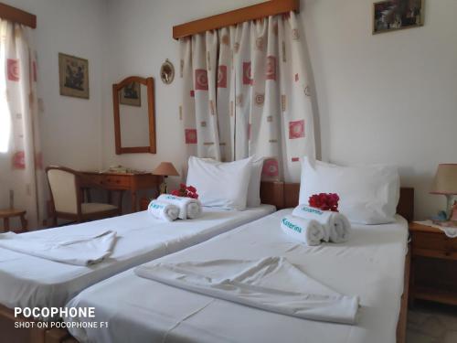 Postel nebo postele na pokoji v ubytování Katerina Apartments
