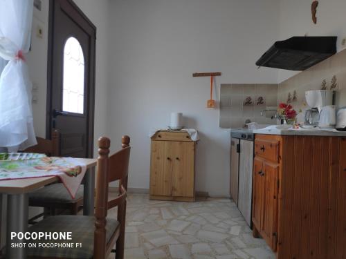 Kuchyň nebo kuchyňský kout v ubytování Katerina Apartments
