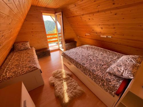 Postel nebo postele na pokoji v ubytování Mountain View Cottage