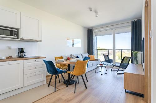 Η κουζίνα ή μικρή κουζίνα στο Symphony Modern Tower Apartamenty