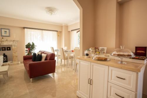 a kitchen with a chair and a table with a cake at Il Castellaccio in Spello