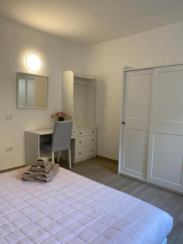 Cama o camas de una habitación en Casa Vacanza Emalí