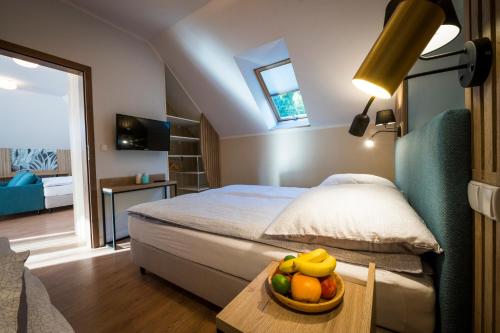 Ένα ή περισσότερα κρεβάτια σε δωμάτιο στο Apartamenty Camping Morski