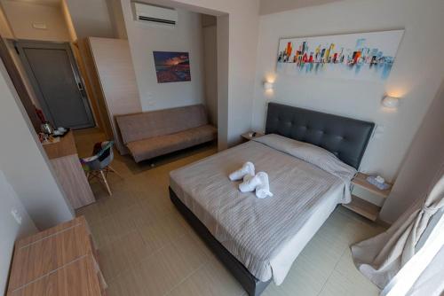 Un ou plusieurs lits dans un hébergement de l'établissement Buka Sandy Beach