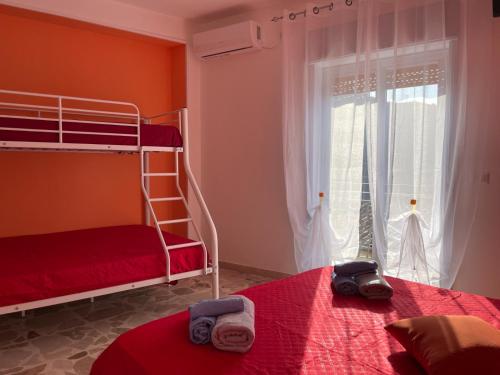 Ένα ή περισσότερα κρεβάτια σε δωμάτιο στο La casa di Aba