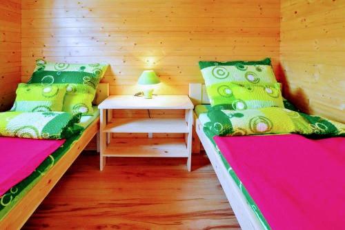 Postel nebo postele na pokoji v ubytování VERANO DOMKI