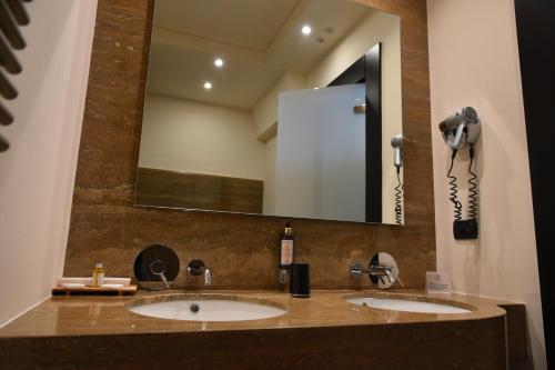 Ein Badezimmer in der Unterkunft Alvino Suite And Breakfast
