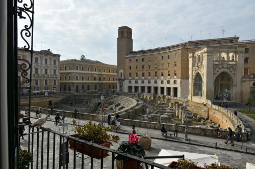a large building with a fountain in front of it at Alvino Suite And Breakfast in Lecce