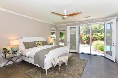 a bedroom with a bed and a ceiling fan at Sonoma Vista Dreams in Sonoma