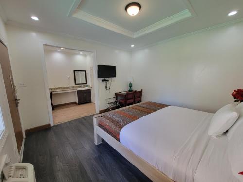 Letto o letti in una camera di Eldorado Atlantic City Beach Block