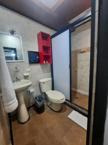 Kúpeľňa v ubytovaní Garcias Suites y Hotel