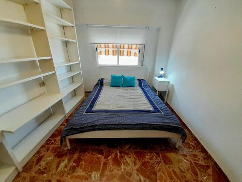 Postel nebo postele na pokoji v ubytování Murcia a tus pies, La Alberca