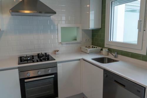 Kuchyň nebo kuchyňský kout v ubytování Casa Eulalia