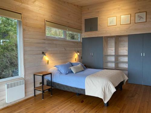 Postel nebo postele na pokoji v ubytování Amukan Lodge