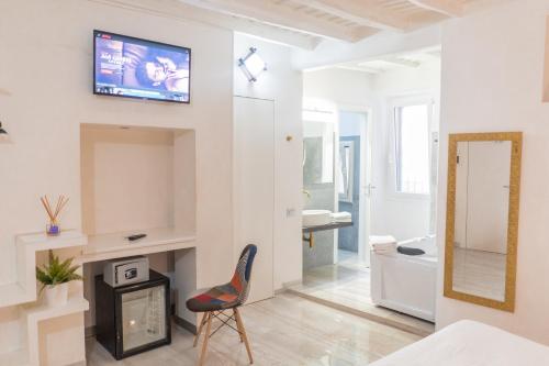 A television and/or entertainment centre at iRooms - Spanish Steps