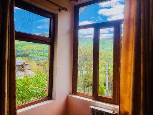 a window with a view of a mountain at Dil Hill by Sam in Dilijan
