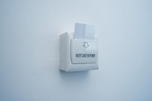 a white electrical outlet on a white wall at Punta Lingua Relais- Room 1 Sunrise Terrace in Procida