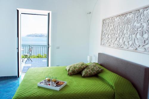 Postel nebo postele na pokoji v ubytování Punta Lingua Relais - Room 2 Sunset Terrace