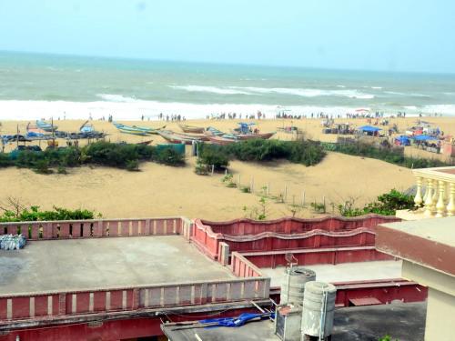 a view of a beach and the ocean at LN BEACH Homestay in Puri