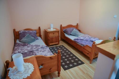 Ένα ή περισσότερα κρεβάτια σε δωμάτιο στο Baranja green peace