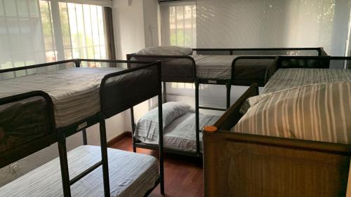 a group of bunk beds in a room at Hostal Madrid Paradise in Madrid