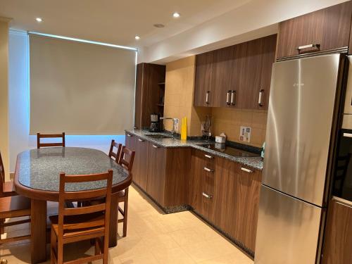 Dapur atau dapur kecil di Apartamentos vacaciones Rio Lever
