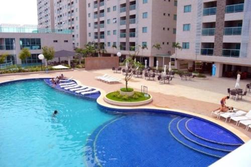 a large swimming pool in a large building at Salinas park 2/4 in Salinópolis