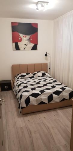Un pat sau paturi într-o cameră la Modern & Elegant Luxury Apartament