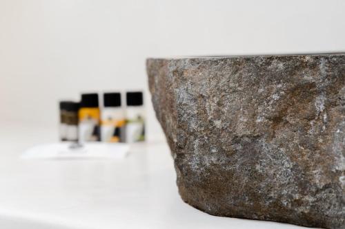a close up of a rock on a table at Melidron Hotel & Suites in Agios Prokopios