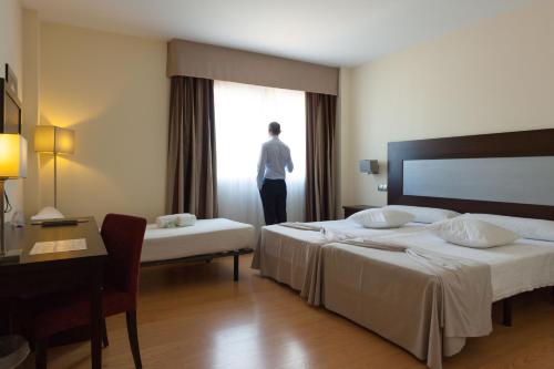 Ένα ή περισσότερα κρεβάτια σε δωμάτιο στο Las Bóvedas