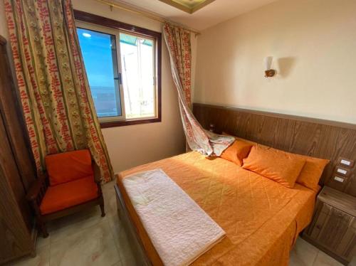 En eller flere senge i et værelse på Villa 29 - Marouf Group