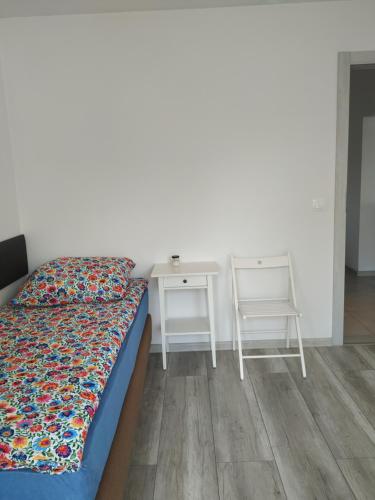Ένα ή περισσότερα κρεβάτια σε δωμάτιο στο Apartament Na górce