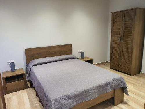 Postel nebo postele na pokoji v ubytování Perama View Apartments